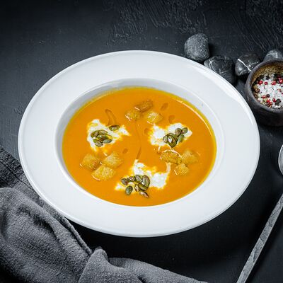 Тыквенный суп со страчателлойв PizzAmore по цене 600 ₽