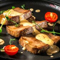 Медальоны из языка в Meat & Grill