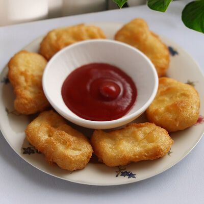 Куриные наггетсы в Юность у моря по цене 230 ₽