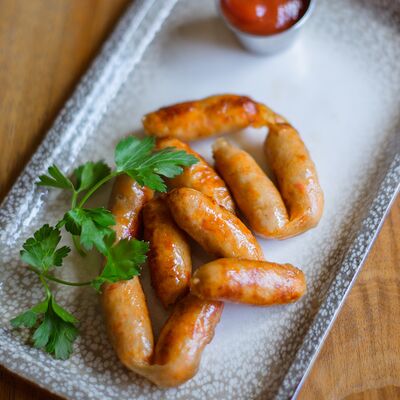 Колбаски куриные острые с томатным соусом в Дюшес по цене 360