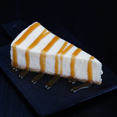 Десерт Чизкейк с банановым топпингом, порция 110гр в ILkato по цене 275 ₽