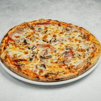 Пицца с ветчиной и грибами в Труффальдино
