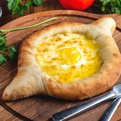 Хачапури с ветчиной в Фабрика пицца по цене 472 ₽