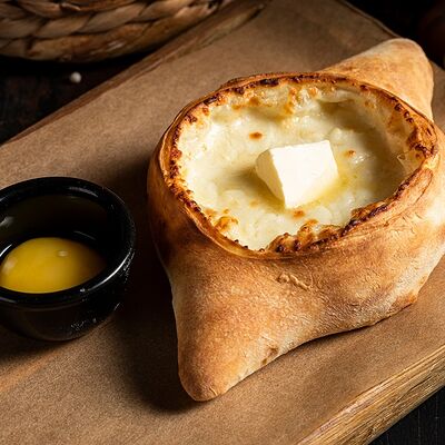 Хачапури по-аджарски в PRO.Хинкали by Novikov по цене 650 ₽