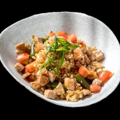 Тяхан с курицей и овощами в Mario по цене 373 ₽