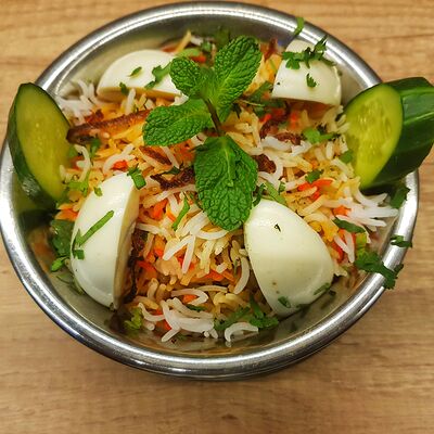Бирияни с кyрицей в Гоаиндийская кухня по цене 790 ₽