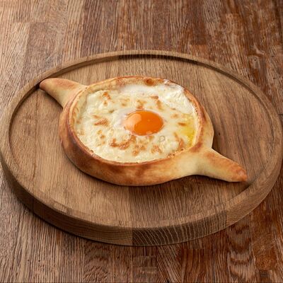 Хачапури по-аджарски в Дзамико по цене 590 ₽