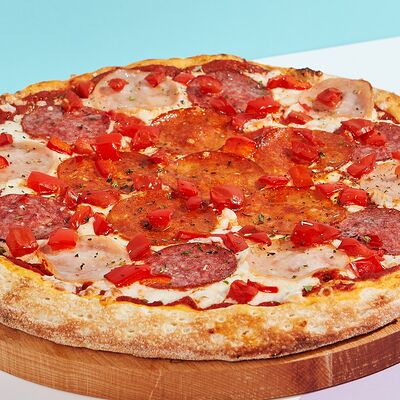 Фирменная Остров пицца 25 см в Ostrov по цене 685 ₽