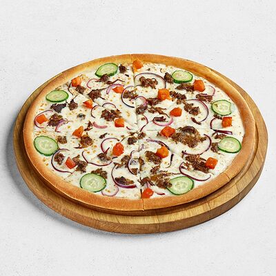 С тушеной олениной большая в ПиццаФабрика по цене 1240 ₽