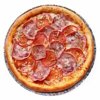 Пицца с ветчиной и томатами в Вулкан парк