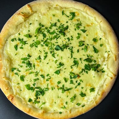 Фокачча на чесночном соусев Pipizza по цене 620 ₽