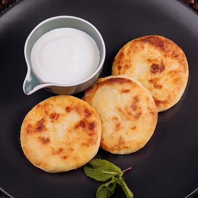 Сырники ванильные со сметаной в Grenka на Труда по цене 280 ₽