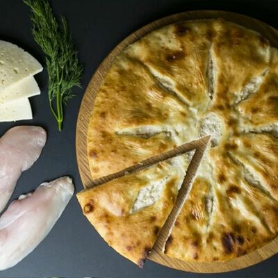 Осетинский пирог с курицей и сыром в Pizzarion по цене 893 ₽