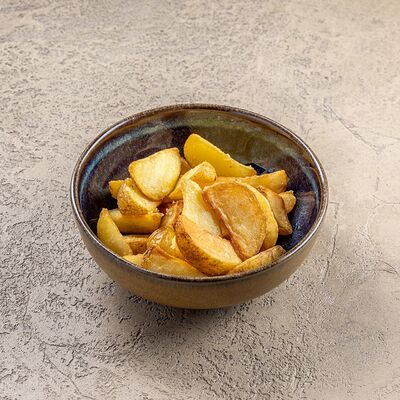 Картофель по-деревенски с чесноком в Тестория по цене 250 ₽