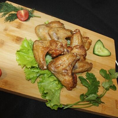 Куриные крылышки в Шашлычный остров по цене 360 ₽