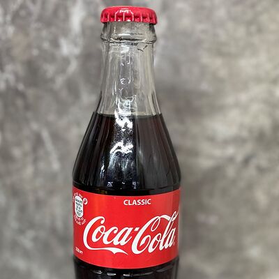 Coca-cola в стеклянной бутылке в Супер Шаурма по цене 250 ₽