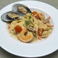 Феттуччине с морепродуктамив Teppanyaki