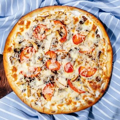 Пицца с курицей, грибами в Тётя Мотя по цене 750 ₽