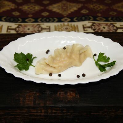 Дамплинг со свининой и овощами в Пловия по цене 70 ₽