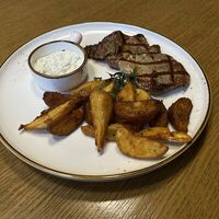 Стейк из свиной шеи в La vino