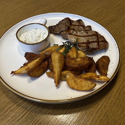 Стейк из свиной шеи в La vino по цене 780 ₽