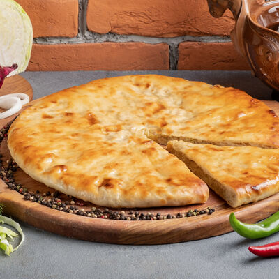 Осетинский пирог с капустой в Жар-Птица по цене 360 ₽