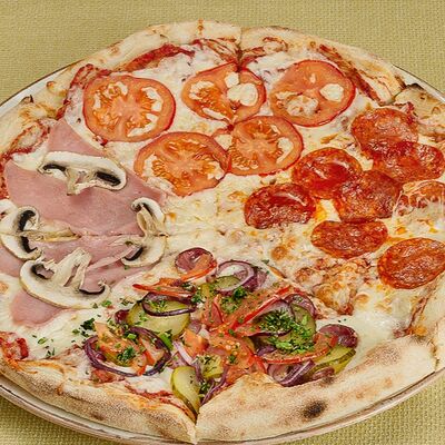 Пицца 4 сезона в Паста Фэмили по цене 920 ₽