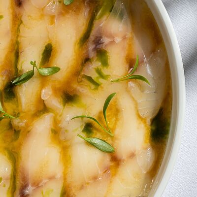 Карпаччо из сибаса с соево-лимонным соусом в Wine Region по цене 1150 ₽