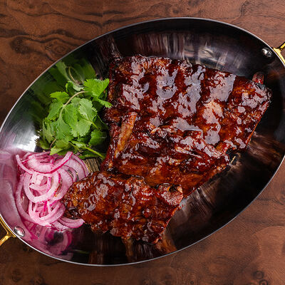 Ребра свиные по-австрийски в Чочо по цене 1200 ₽