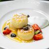 Сырники с кокосовой сгущенкой и сметаной в Eclair по цене 570