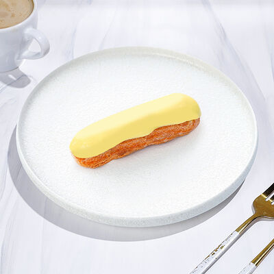 Эклер лимонный в Магбургер & Братья Караваевы по цене 195