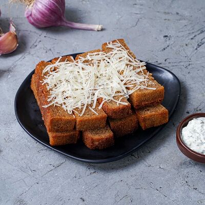 Гренки чесночные в Гриль Хаус по цене 211 ₽