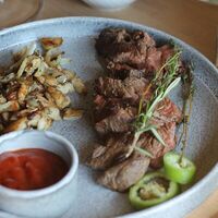 Стейк мясника с жареными вешенками в Опера
