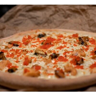 С морепродуктами в Il Solo Pizza по цене 550 ₽