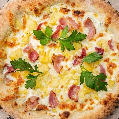 Картофель, бекон и трюфельное масло в OTTO Pizzeria по цене 780 ₽