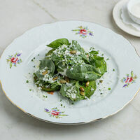 Оладьи из цукини с яйцом пашот в Nomad