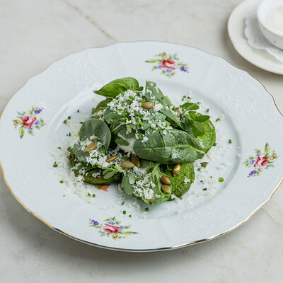 Оладьи из цукини с яйцом пашот в Nomad по цене 750 ₽