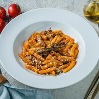 Ригатони с говядиной в томатном соусе в PizzAmore