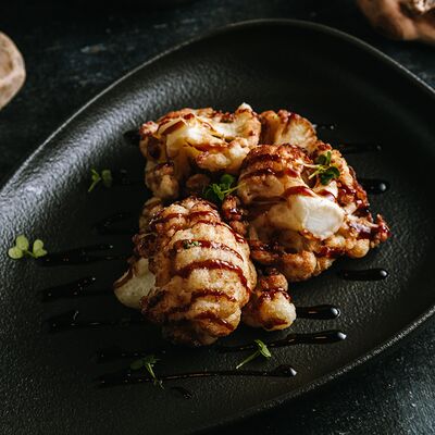 Жареная цветная капуста с соусом унаги в Мамонт по цене 350 ₽