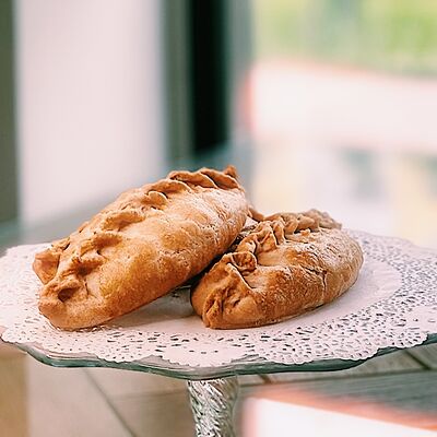 Пирожок с капустой и грибами в Кондитерская Эклер по цене 147 ₽