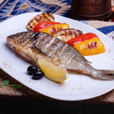 Дорадо с овощами гриль в Кафе кавказской кухни Хурма по цене 810 ₽