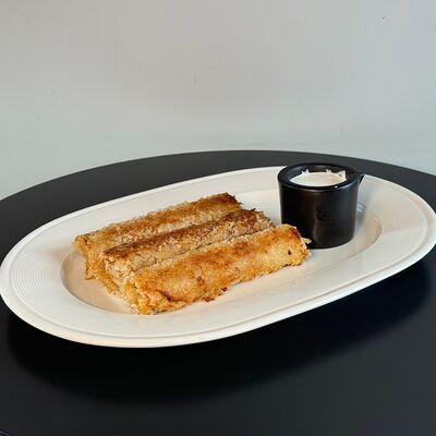 Хрустящие блинчики, фаршированные телятинойв Великие по цене 828 ₽