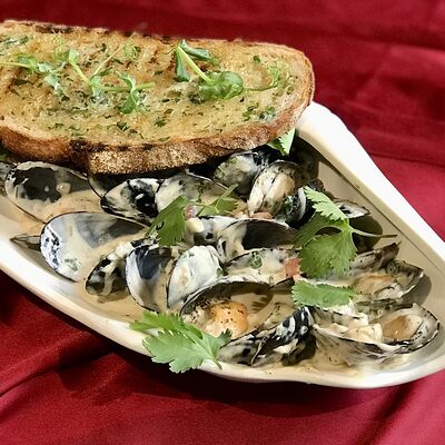 Голубые мидии в соусе блю чиз в Вино и еда по цене 1290 ₽