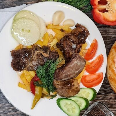 Казан-кебаб в Лепёшка из тандыра по цене 549 ₽