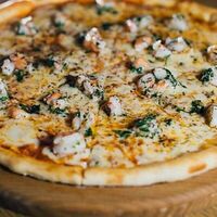 Пицца с креветками в La Prima Pizzeria Margherita