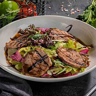 Салат Теплый с говяжьим языком в Тбилисимо по цене 702 ₽