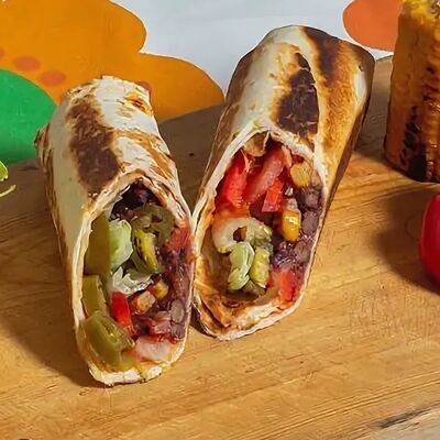 Буррито Веган в Пицца Pomodoro Суши по цене 890 ₽