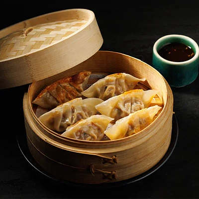 Дим самы со свининой ким чи в Zuma по цене 1020 ₽