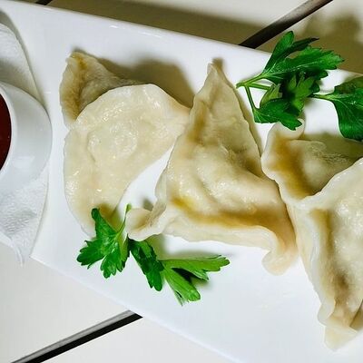 Хинкали в КафеПельмешкин дворик по цене 345 ₽