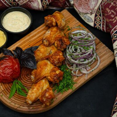 Шашлык из куриных крылышек в 17 шампуров по цене 750 ₽